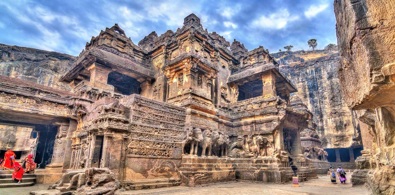 Ajanta and Ellora caves carved into rocky cliffs