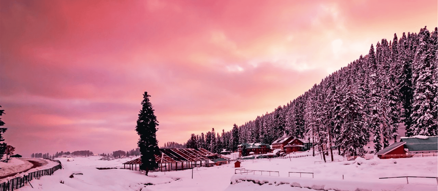 Skiers enjoying snow and cable car view in Gulmarg, Jammu and Kashmir