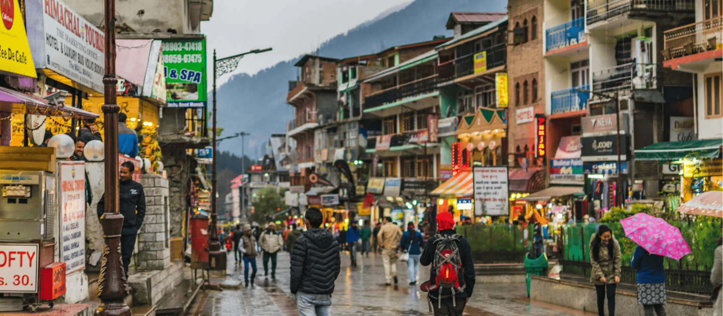Mall Road Manali market street with shops and visitors