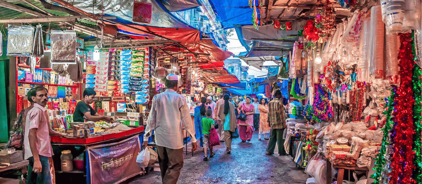 A colorful shop in Moti Bazaar, Haridwar, selling religious items and souvenirs.