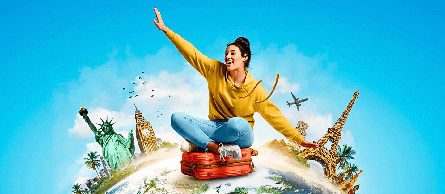 Excited female traveler sitting on a suitcase surrounded by iconic world landmarks like the Eiffel Tower and Statue of Liberty